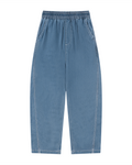 Blue denim pants on a white background