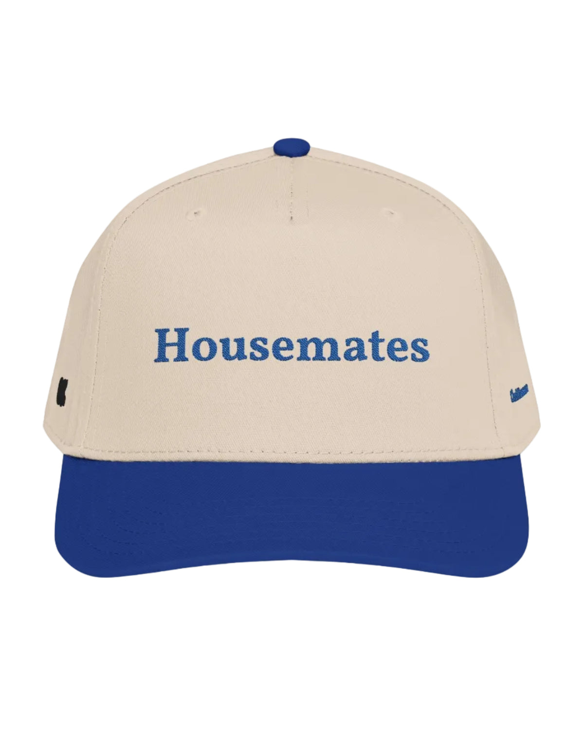 A structured baseball cap with a cream-colored crown and a royal blue visor, featuring the word 'Housemates' embroidered in blue across the front. The cap has a matching blue button on top and small blue embroidery on the side.