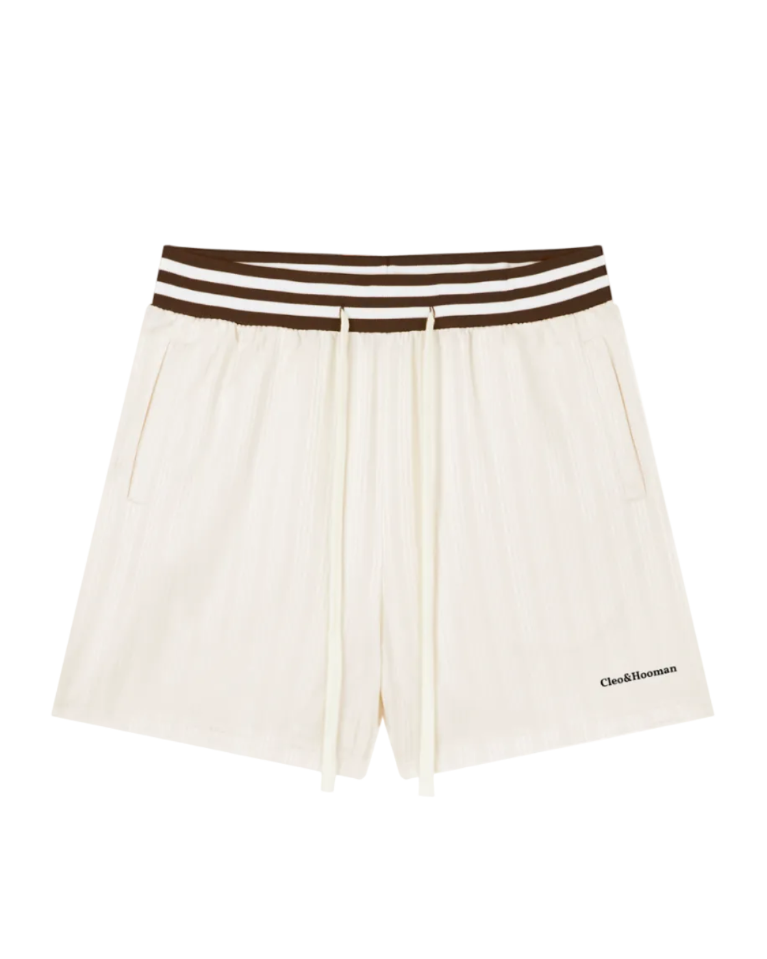 Off-white pleated shorts with a brown and white striped elastic waistband, featuring a drawstring and a small black 'Cocktail Man' logo on the lower left hem, shown against a plain white background.