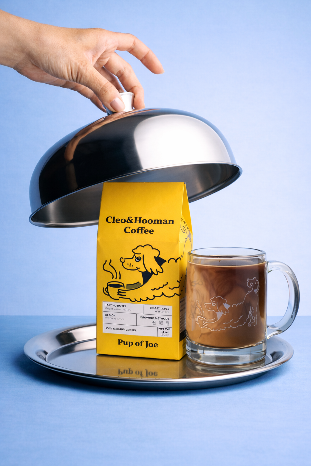 Cleek & Hooman Coffee package with a glass mug of coffee on a silver tray against a blue background