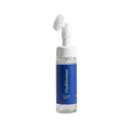 Bottle with blue label and white pump on a light gray background
