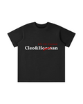 A black short-sleeve t-shirt with a graphic on the chest reading 'Cleo&Hoonan' in white, crossed out with a red scribble, and 'Little Hoonam' written in red above it, shown on a plain white background.
