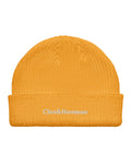 Yellow beanie with 'Cleo&Hooman' branding on a white background