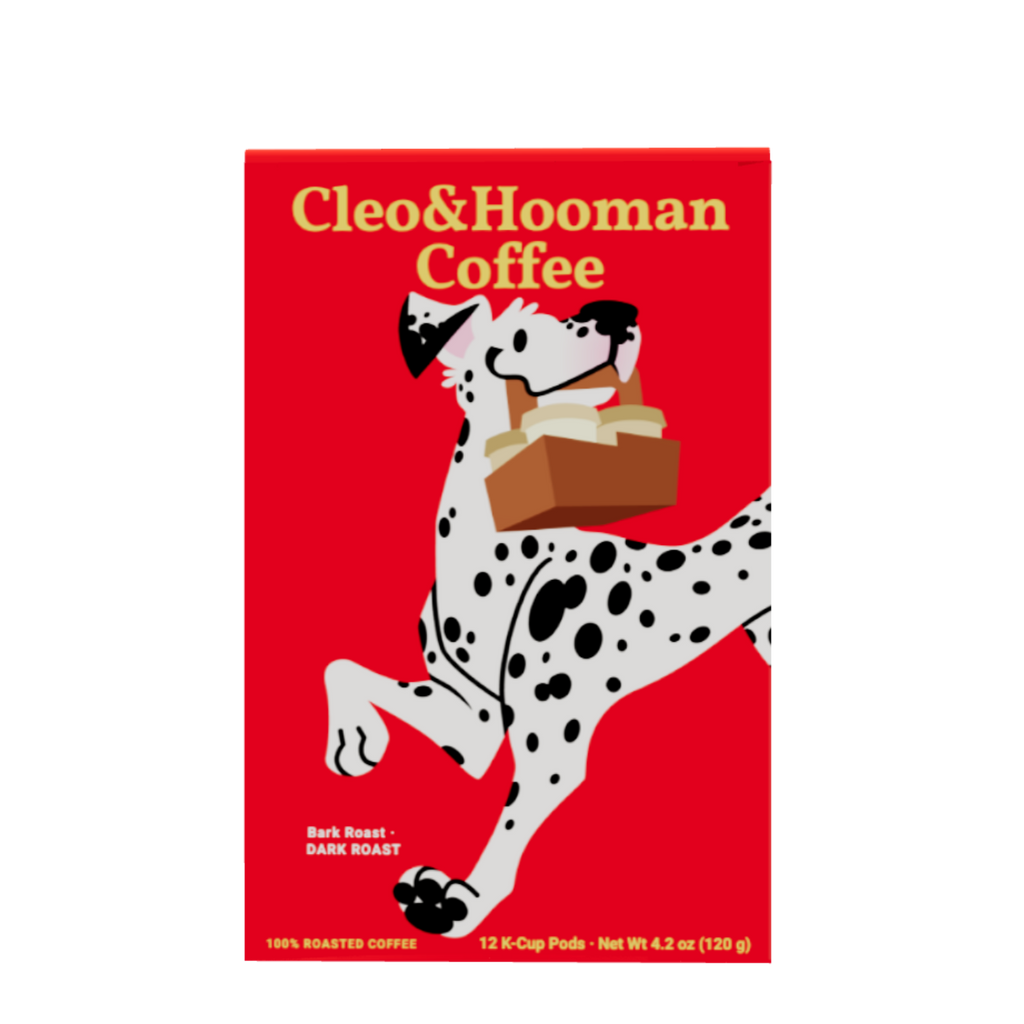 A red box of Cleo & Hooman Coffee featuring a cartoon Dalmatian carrying a coffee cup, shown on a plain white background.