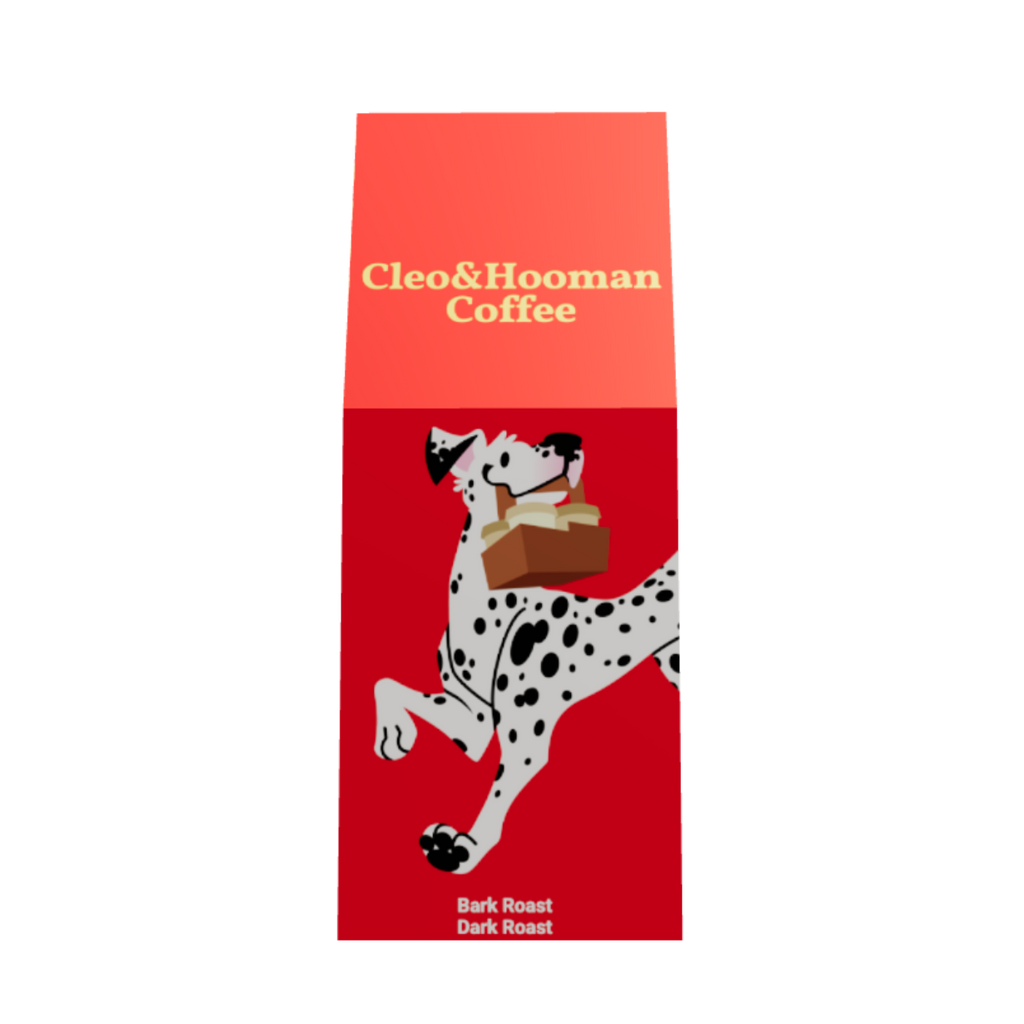 A tall, narrow red box of Cleo & Hooman Coffee, featuring a white Dalmatian dog illustration carrying a brown coffee bag, on a plain white background.
